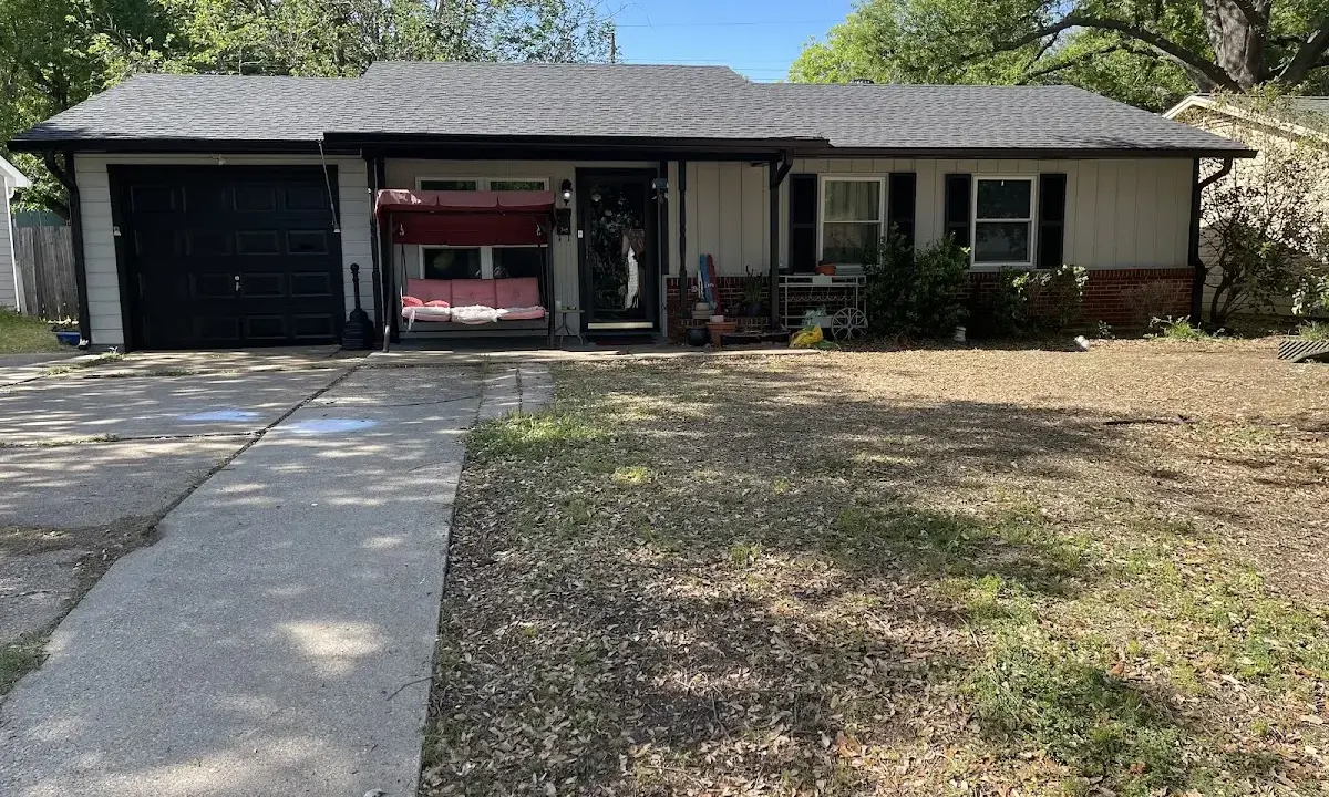 Hail Damage Roof Repair crew at work on a residential roof in Beaufort